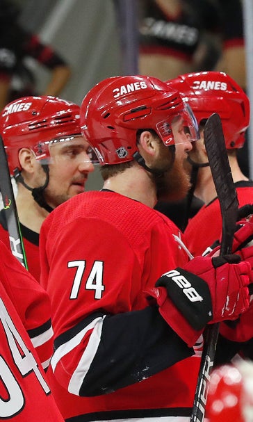 Hurricanes beat Flyers in OT, bring back Justin Williams